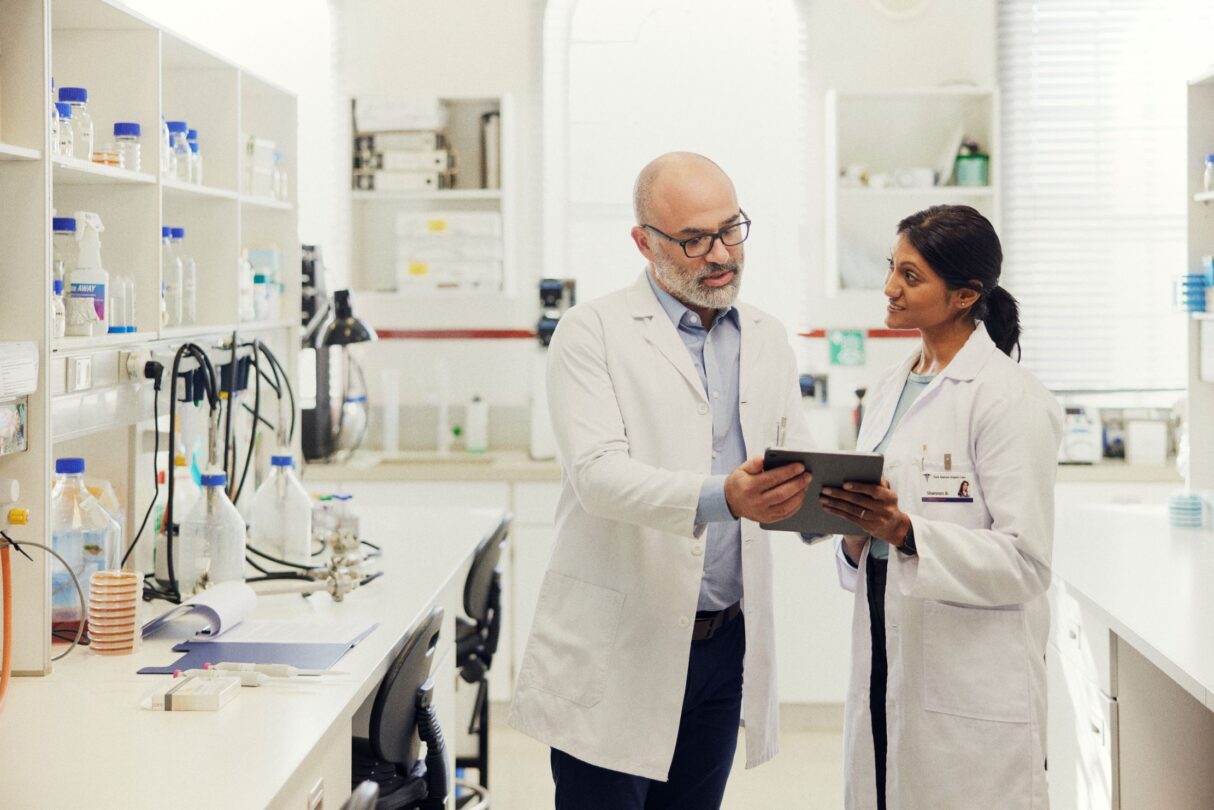 Two chemists working in a lab