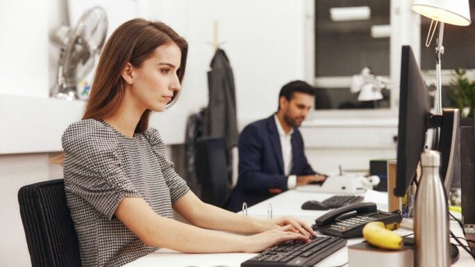 Woman calculating margin of safety