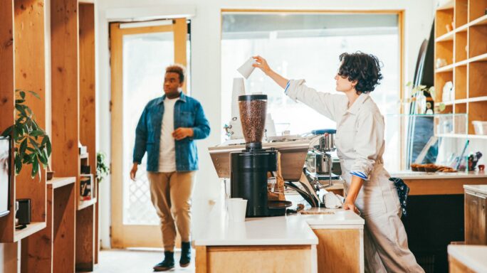 Woman working in coffee shop