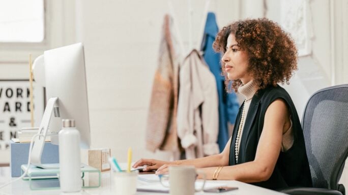 Woman working at a computer